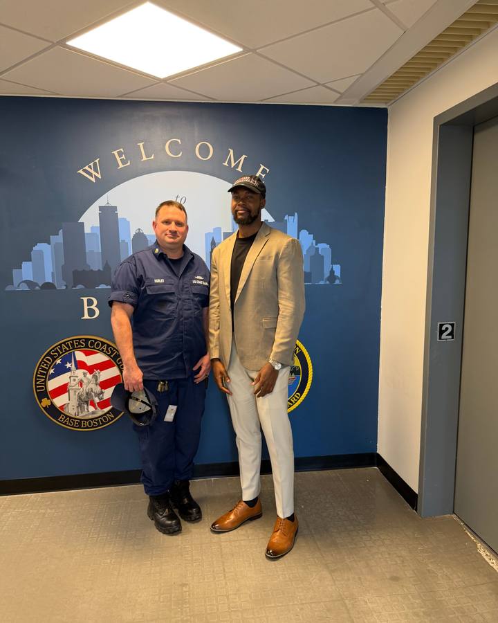 Festus Iyorah with a U.S. Coast Guard officer at Base Boston