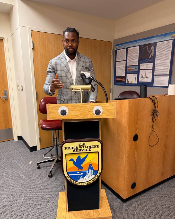 Festus Iyorah speaking at a U.S. Fish and Wildlife Service lectern